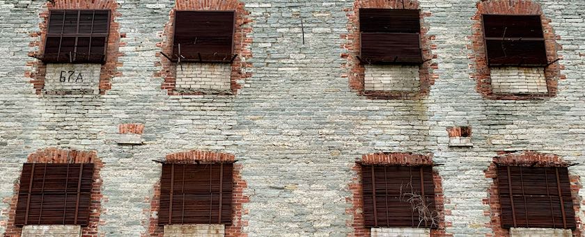 Broken windows at sea fortress Patarei in Tallinn (Estonia)