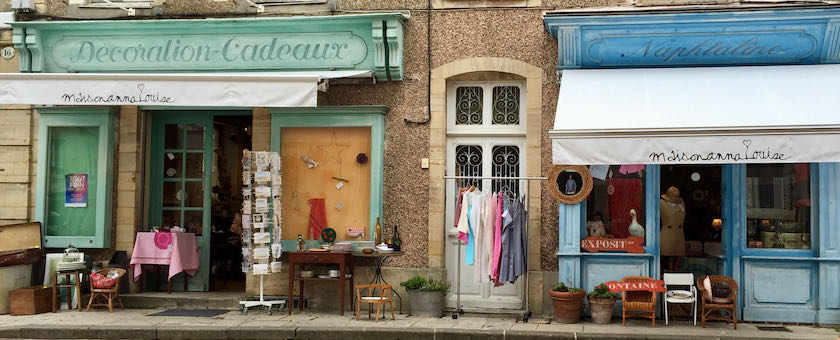 Storefront of traditional shops (seen in Bayeux, France)